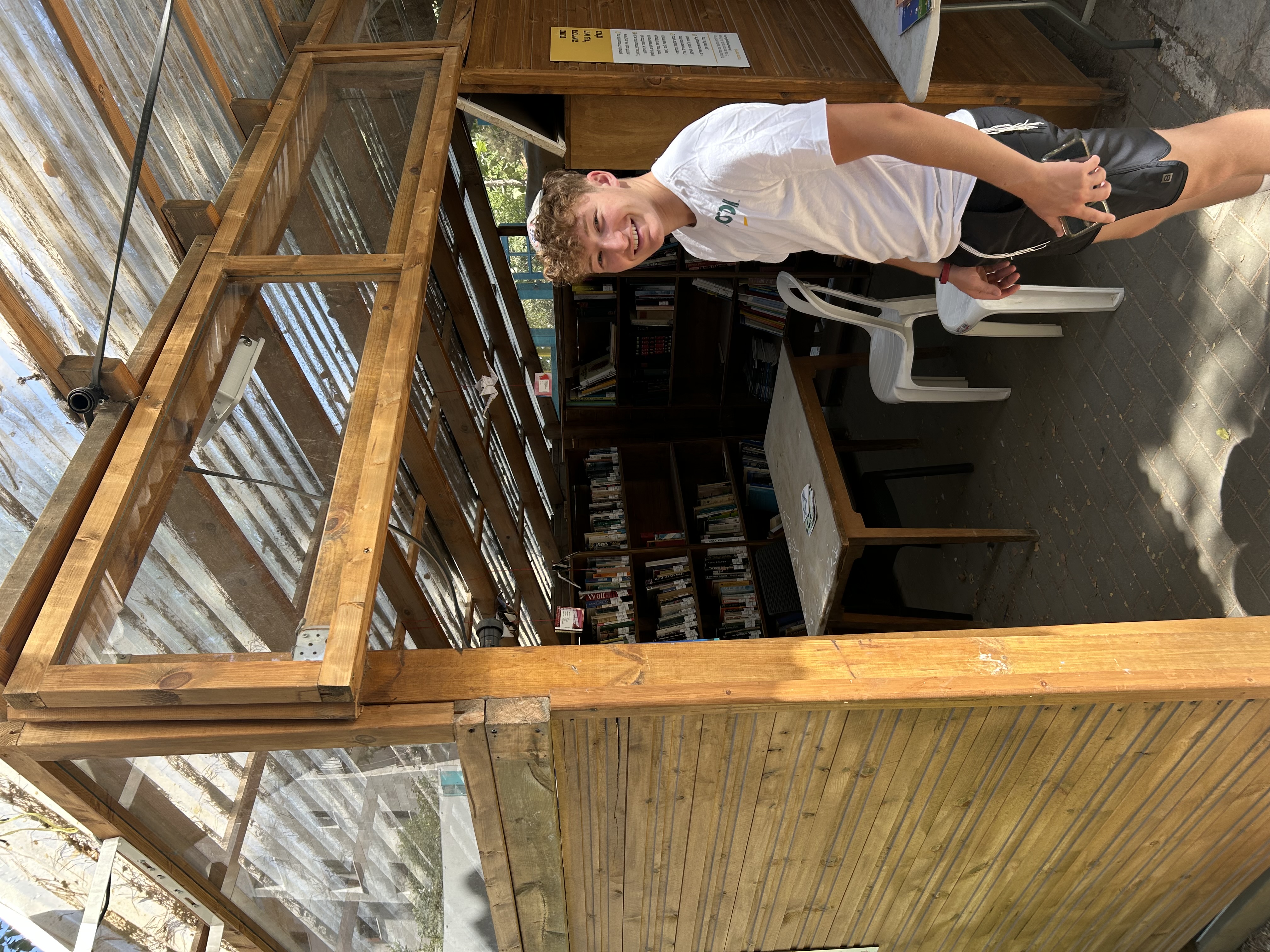 Avi and Jonathan visit the free outdoor book stall at the nearby HaPalmach community center. Hebrew, English, and French titles available!