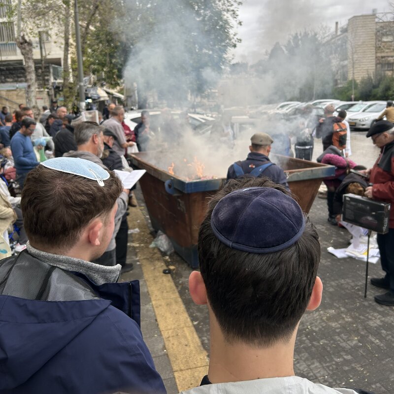 Avi and Moshe at the neighborhood spot for “burning of the leaven” just before Passover